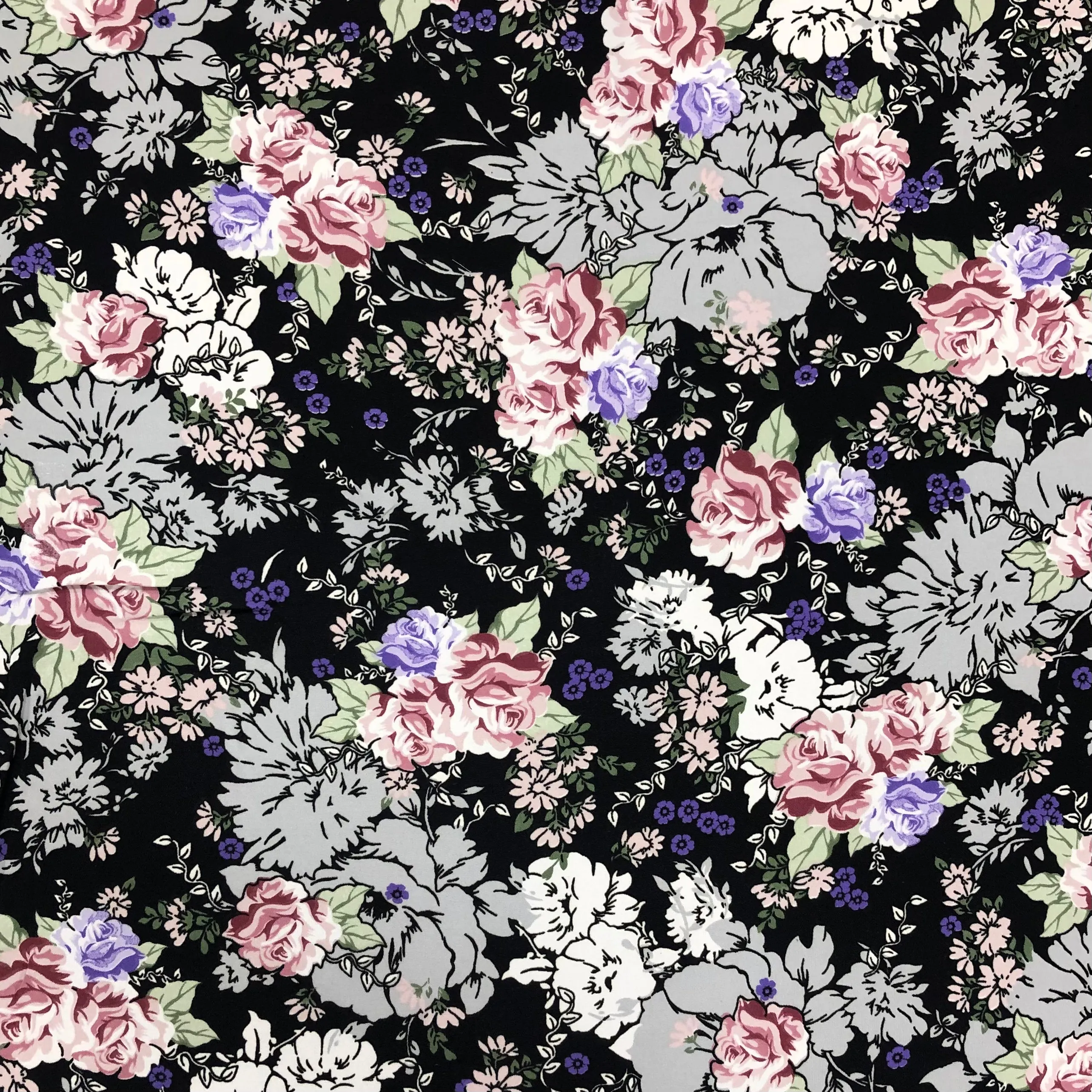 All Over Floral on Black Polyester Fabric