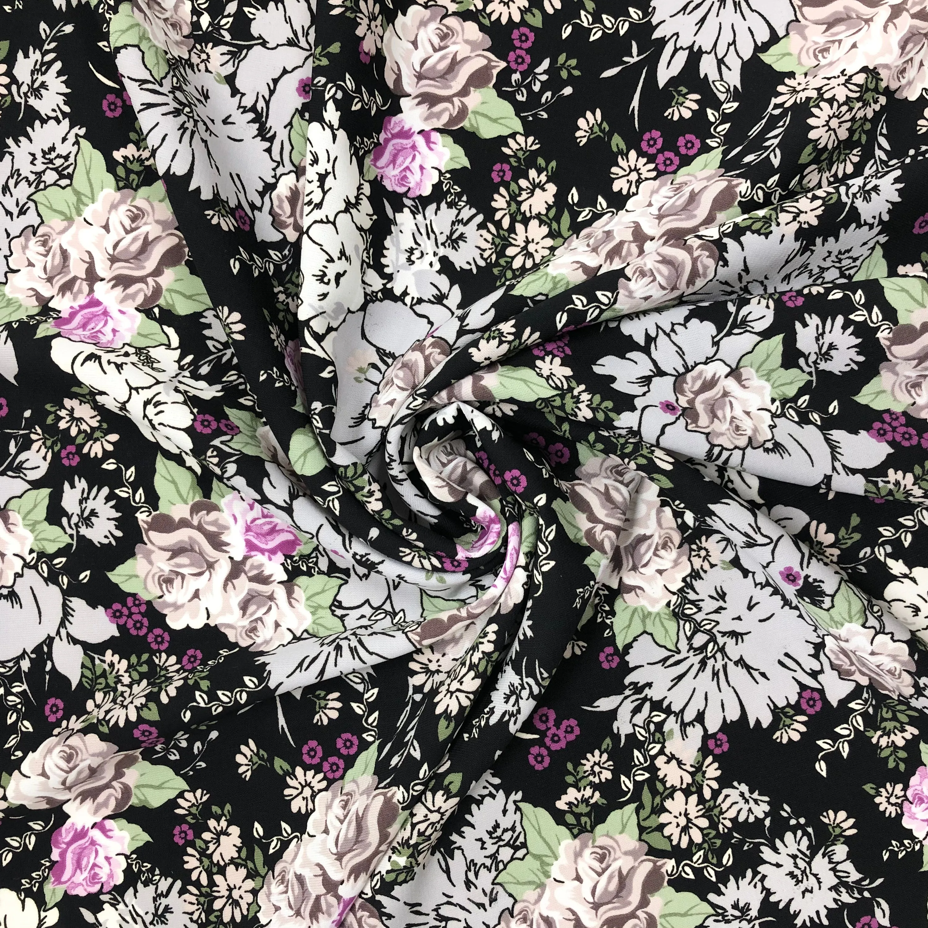 All Over Floral on Black Polyester Fabric